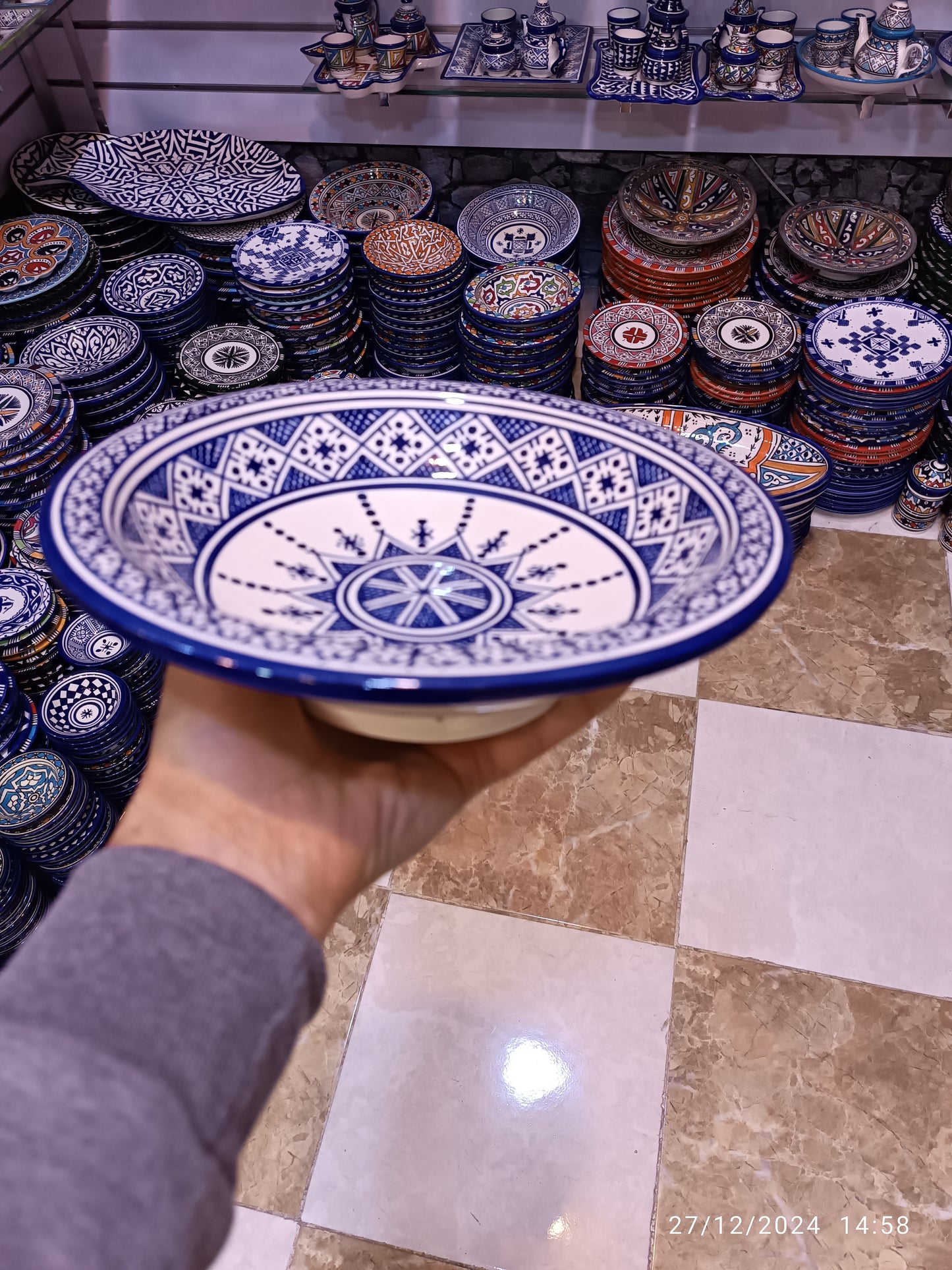 Serving plates made of white clay, hand-painted and hand-decorated.