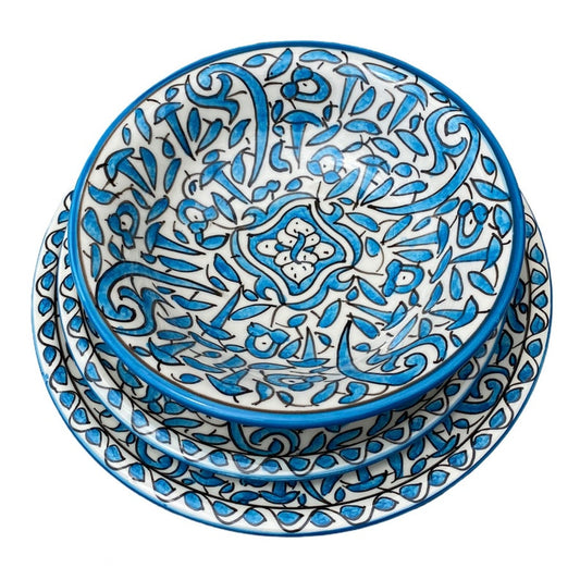 Serving plates made of white clay, hand-painted and hand-decorated.