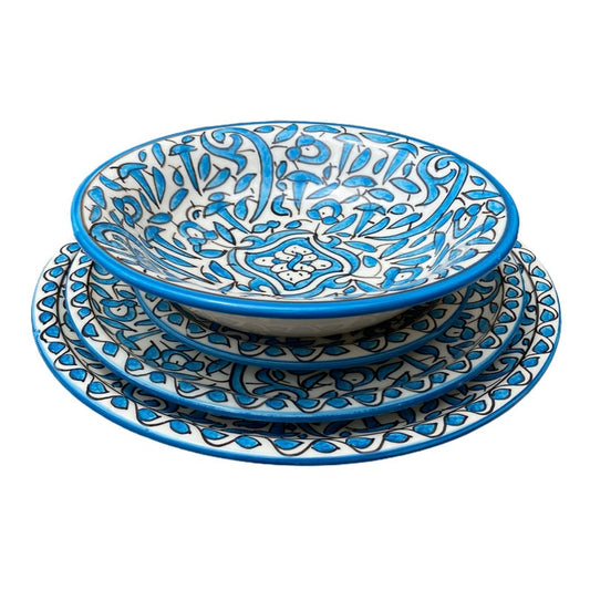 Serving plates made of white clay, hand-painted and hand-decorated.